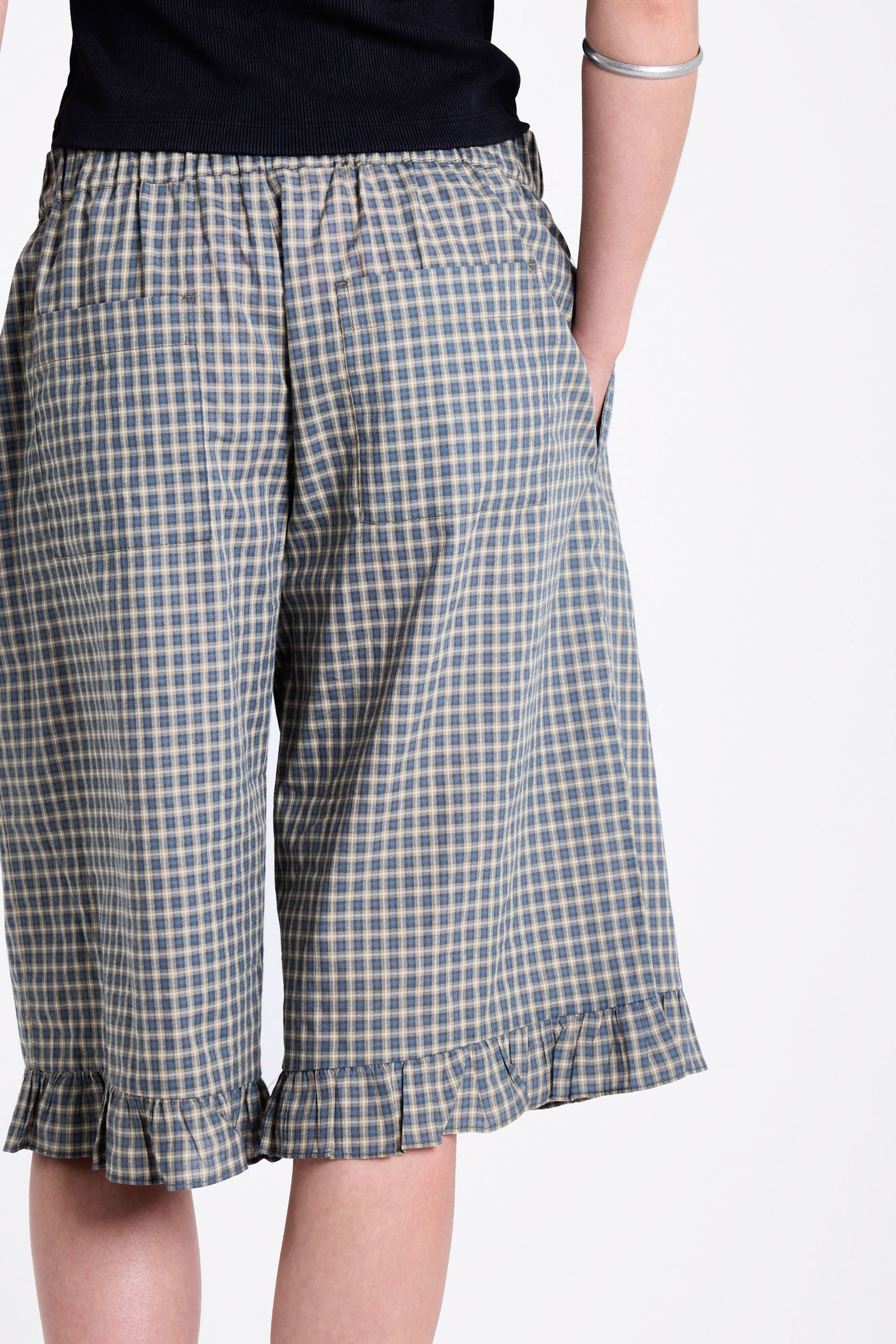 Green and yellow gingham longline boxer shorts, relaxed capri pants, with elasticated waistband and ruffle hem, worn by model