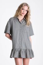 Green and yellow check shirt style mini dress with buttons, collar and peplum hem, worn by model