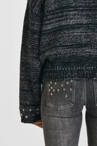 Black and grey chunky spacedye knit zip through cardigan with silver studs, worn by model
