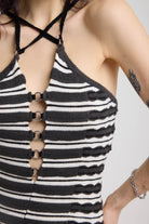 Black and grey textured stripe knit maxi dress with cut out front and silver hardware, worn by model