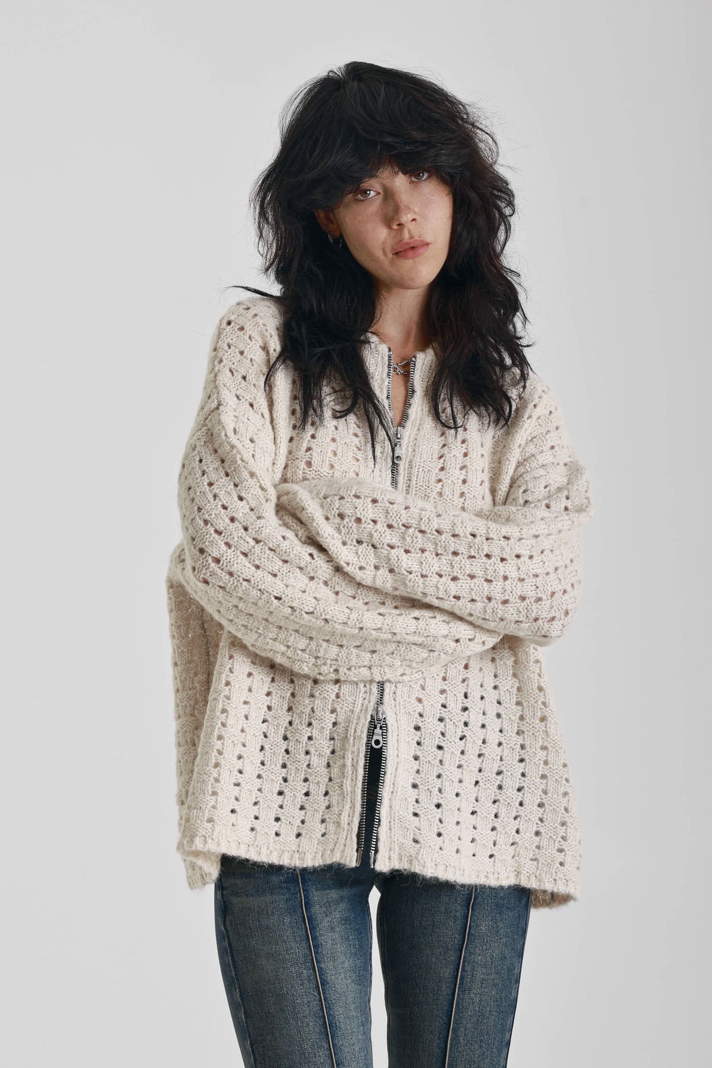 Off white open knit oversized cardigan with zip, worn by model