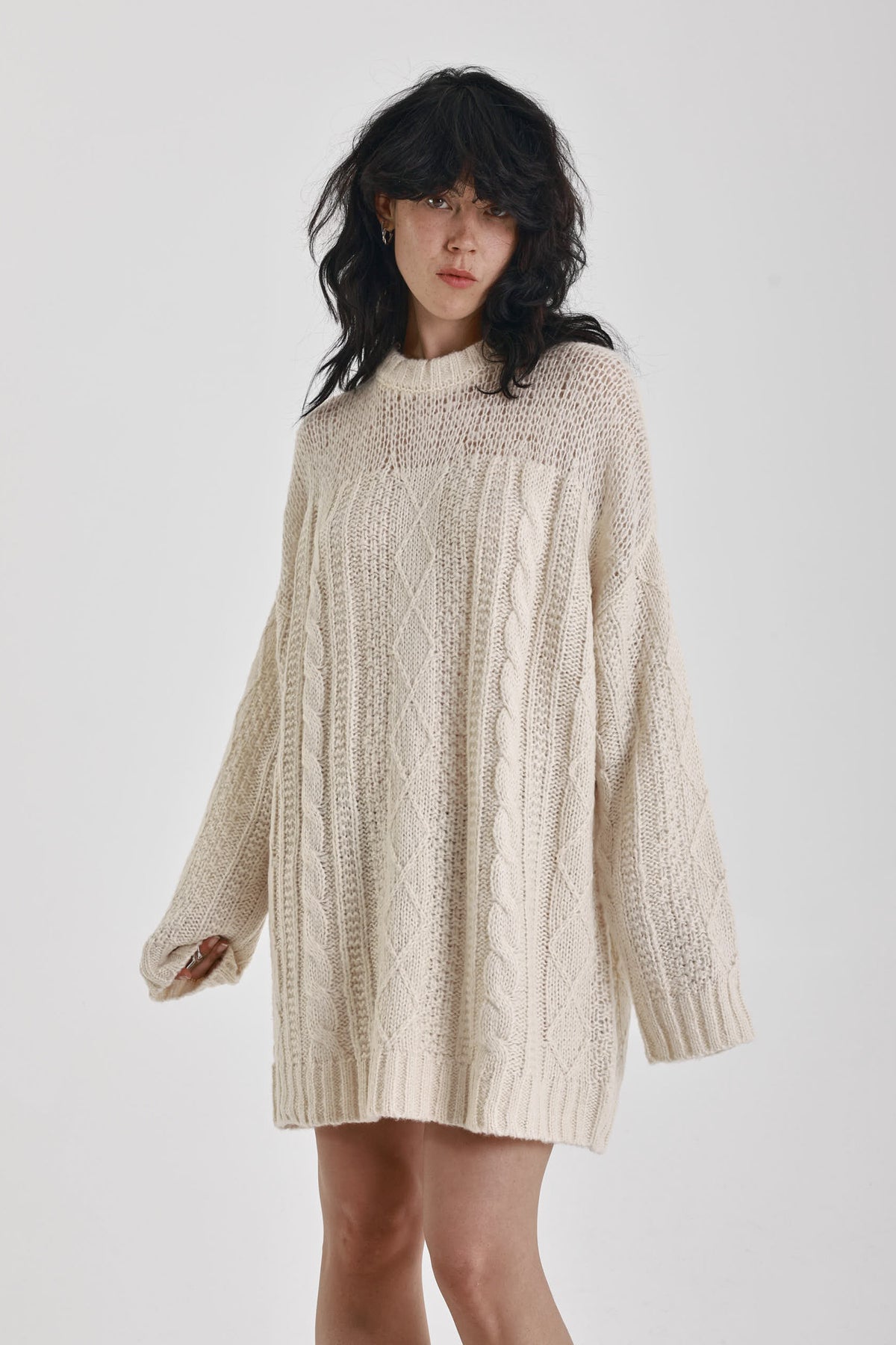 Ecru cable knit chunky knitted mini dress, worn by model