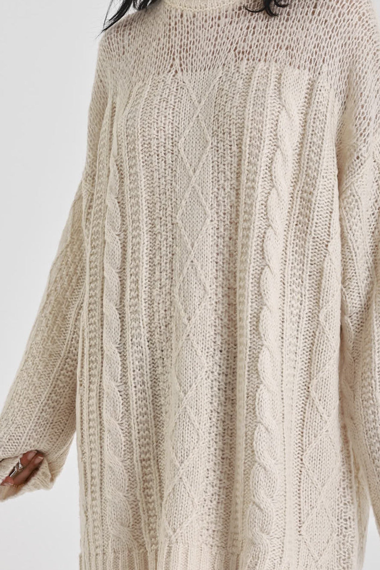 Ecru cable knit chunky knitted mini dress, worn by model