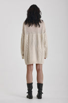 Ecru cable knit chunky knitted mini dress, worn by model