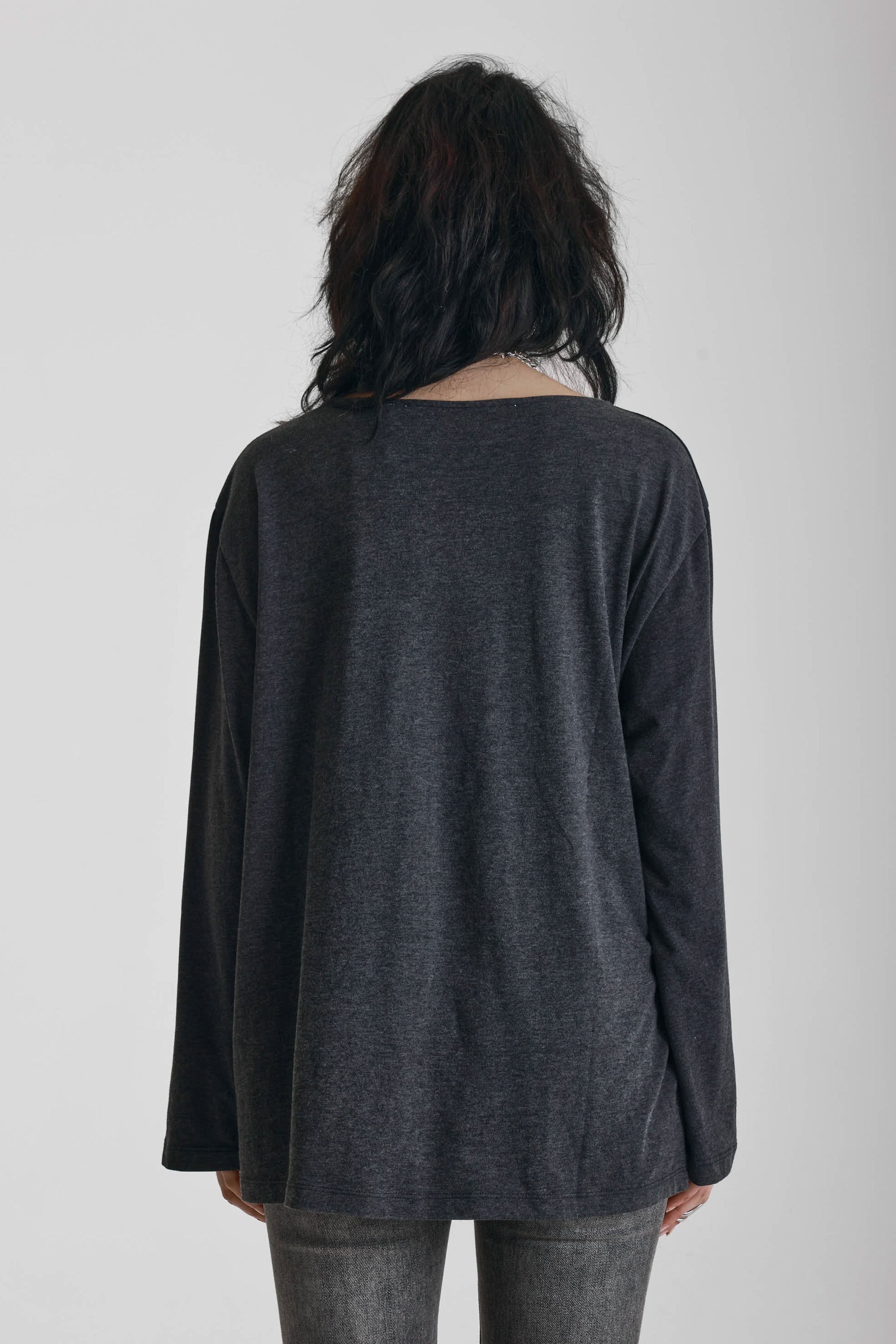 Washed black slouchy fit long sleeve t-shirt with skeleton ribcage burnout graphic, worn by model
