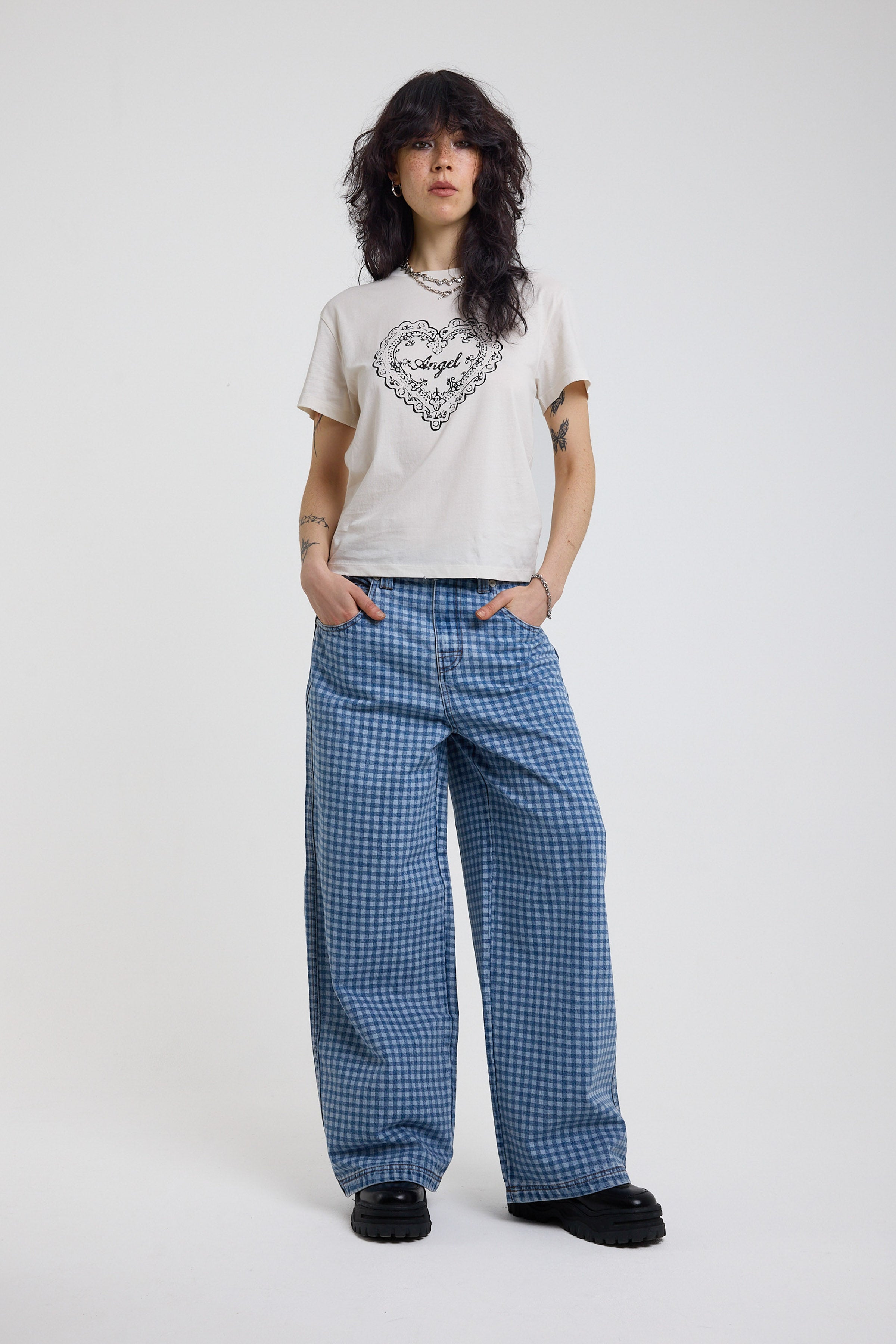 Blue gingham checked baggy wide leg release jeans, worn by model