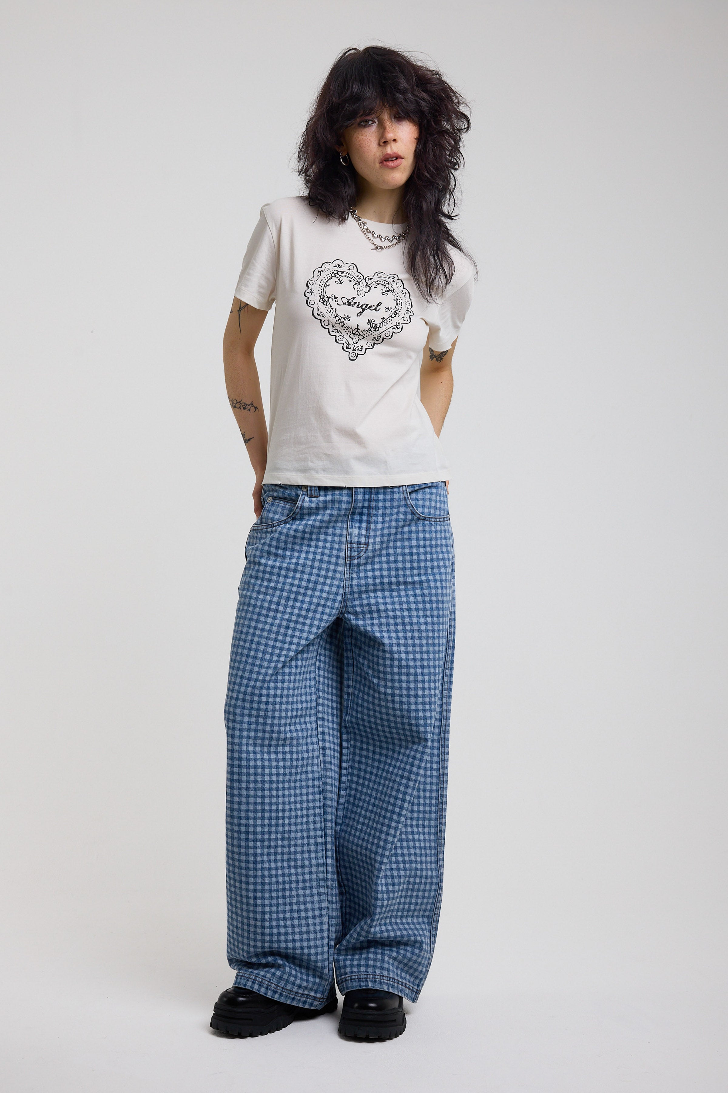 Blue gingham checked baggy wide leg release jeans, worn by model