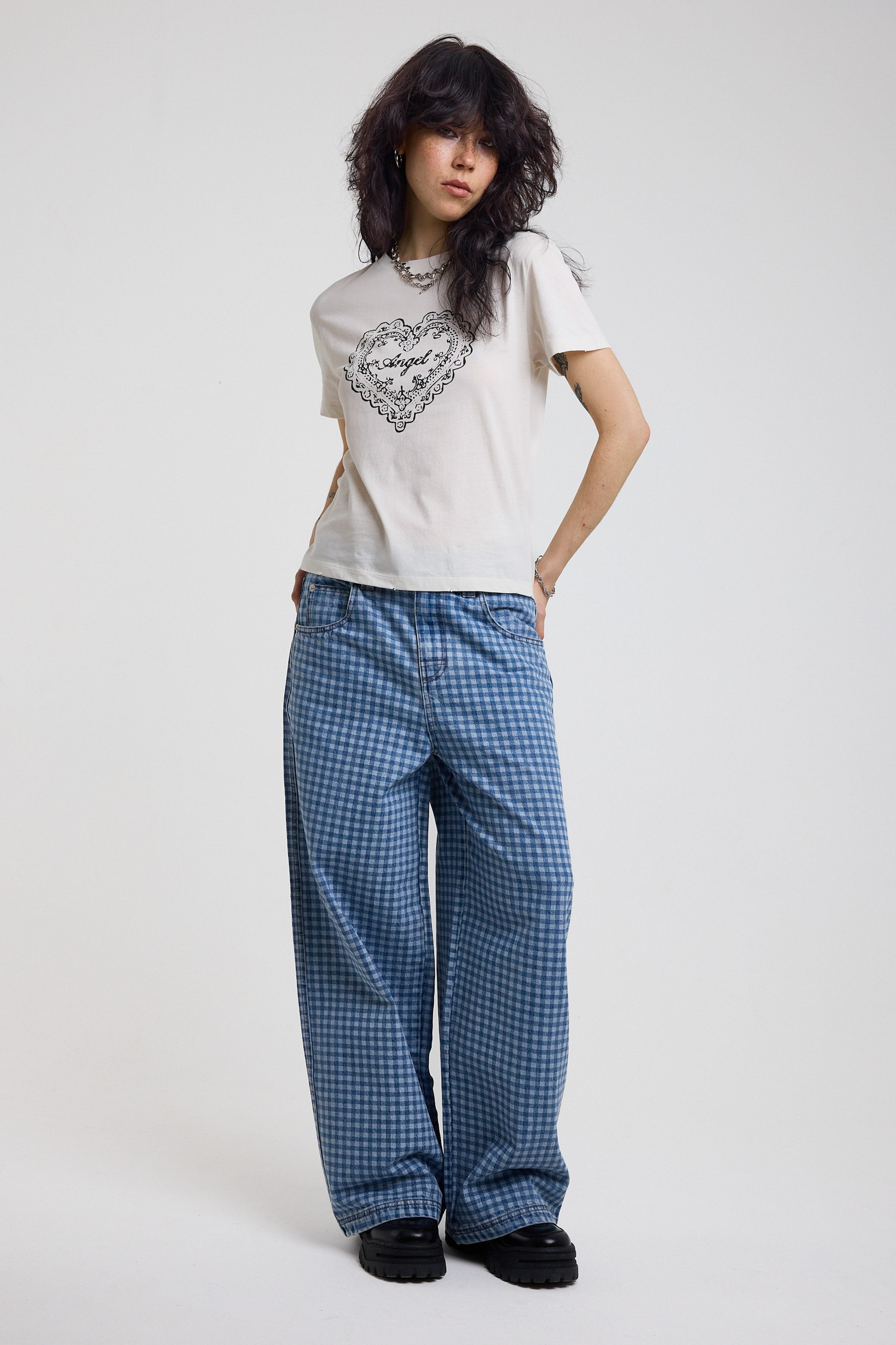Blue gingham checked baggy wide leg release jeans, worn by model