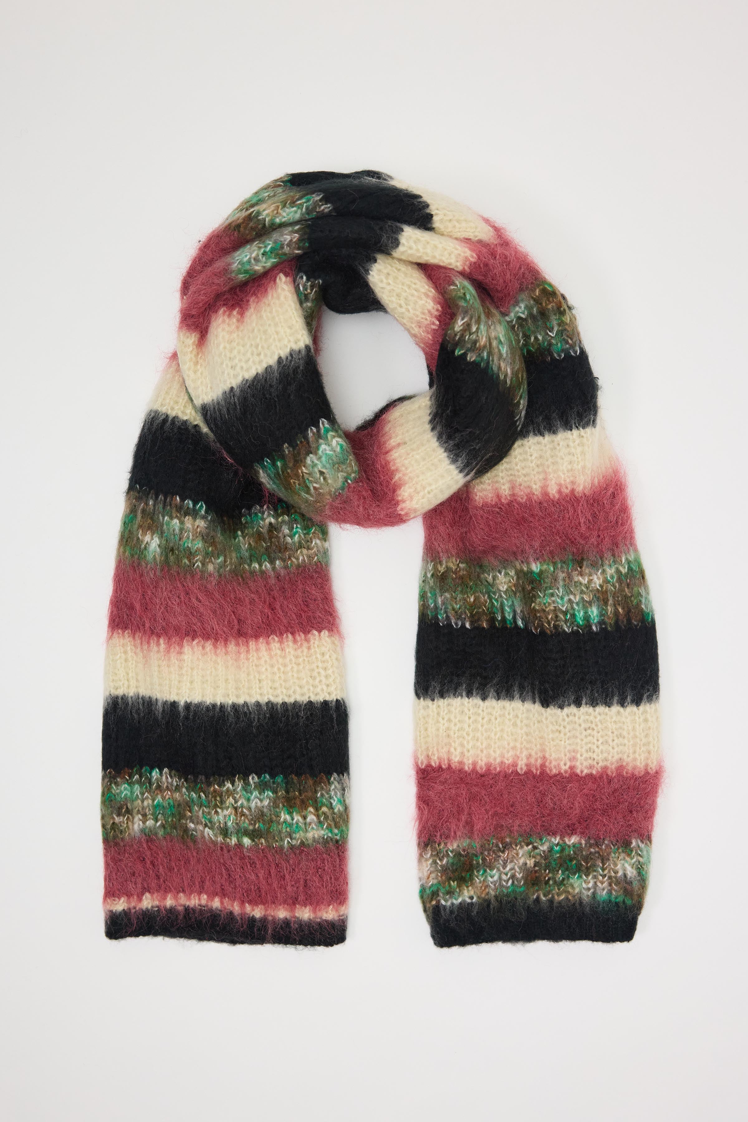 Mixed black, cream, pink and green stripe textured knit oversized blanket scarf, worn by model.