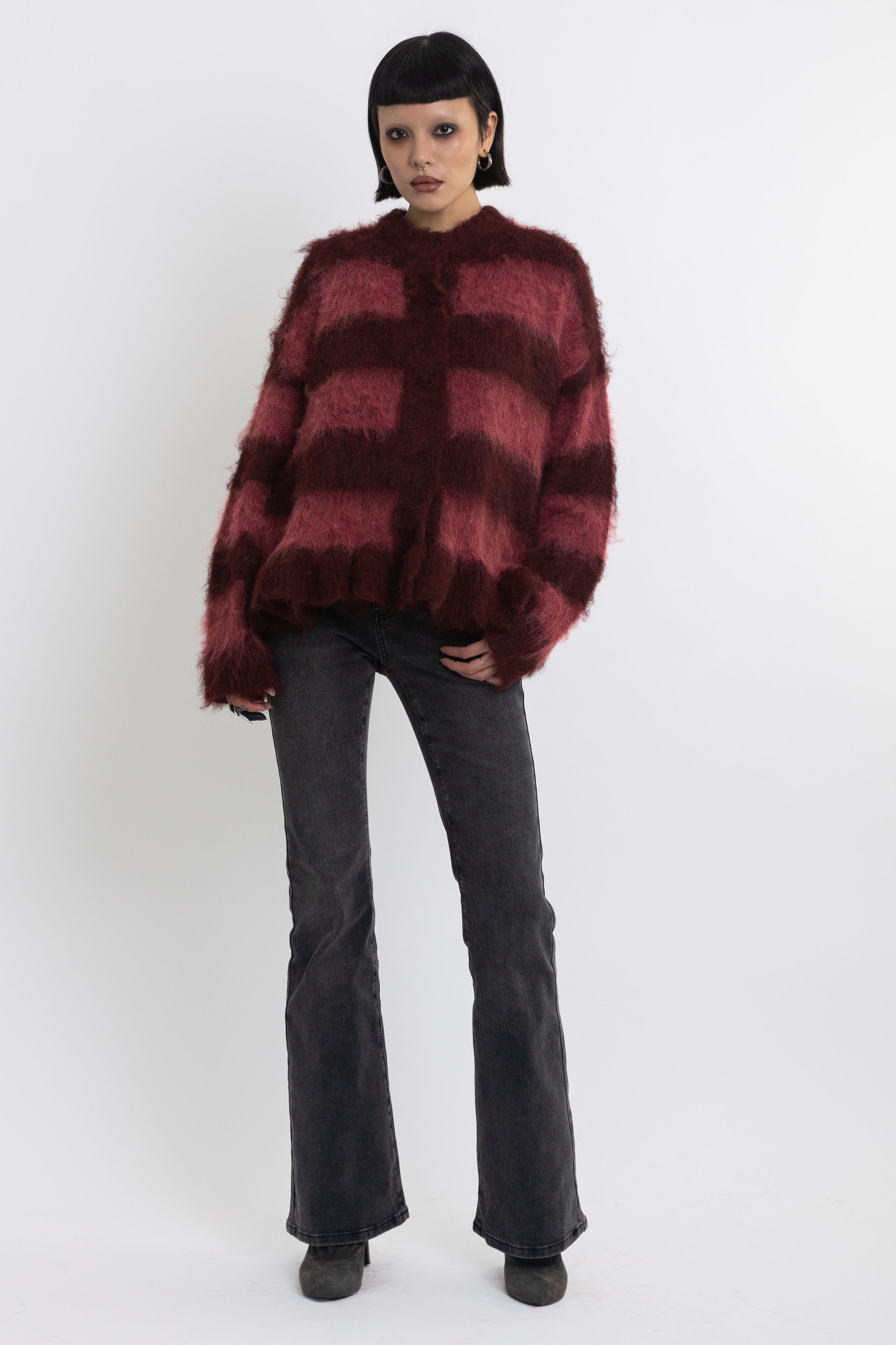 Bugundy and dusty stripe fuzzy knit cardigan with peplum hem, worn by model