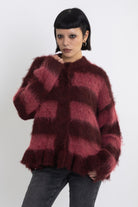 Bugundy and dusty stripe fuzzy knit cardigan with peplum hem, worn by model