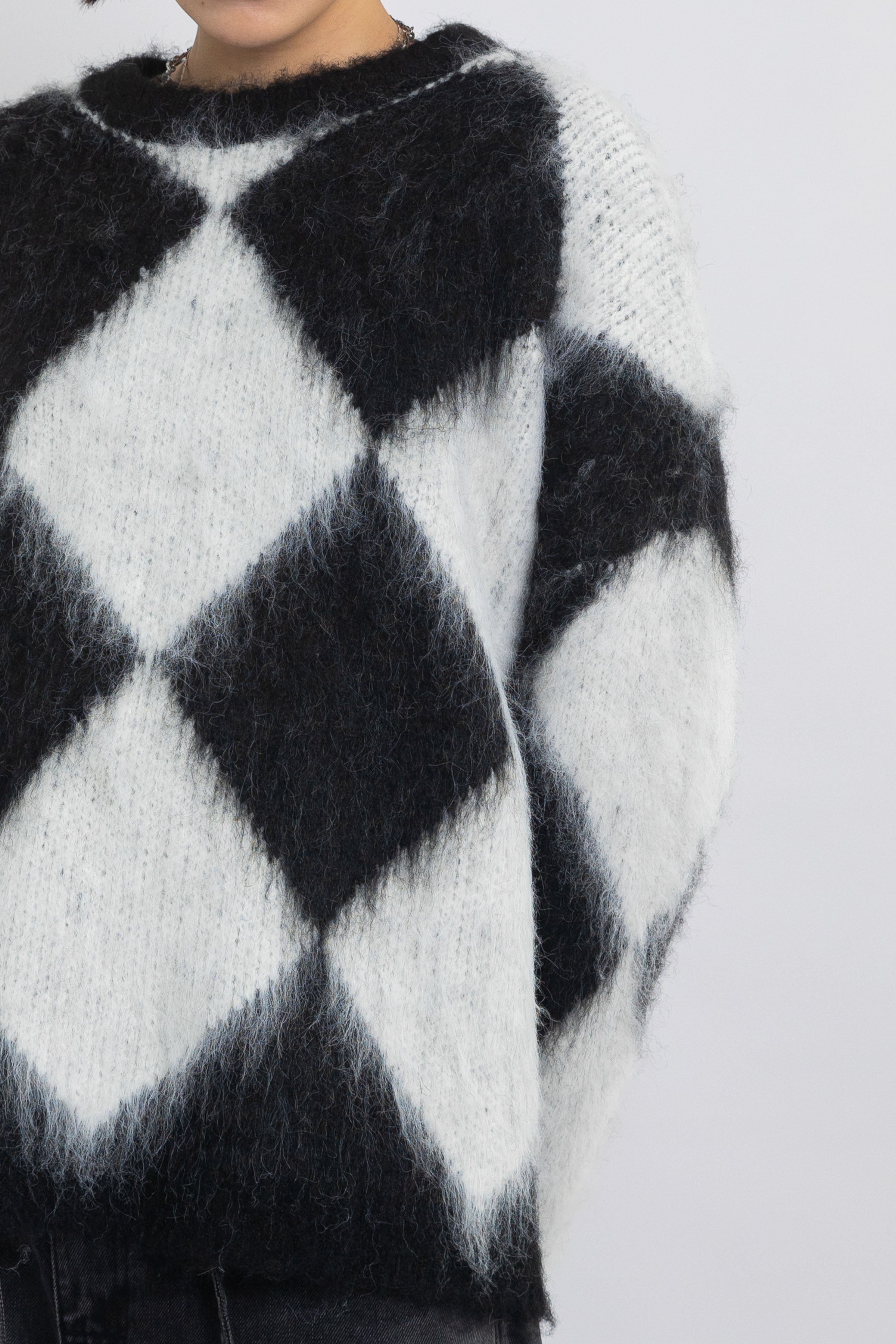 Black and white diamond argyle check fluffy knit oversized jumper, worn by model