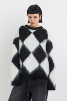 Black and white diamond argyle check fluffy knit oversized jumper, worn by model