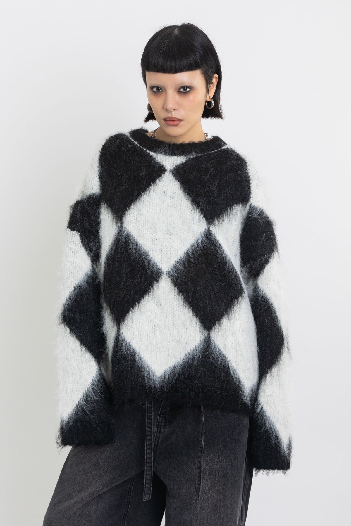 Black and white diamond argyle check fluffy knit oversized jumper, worn by model