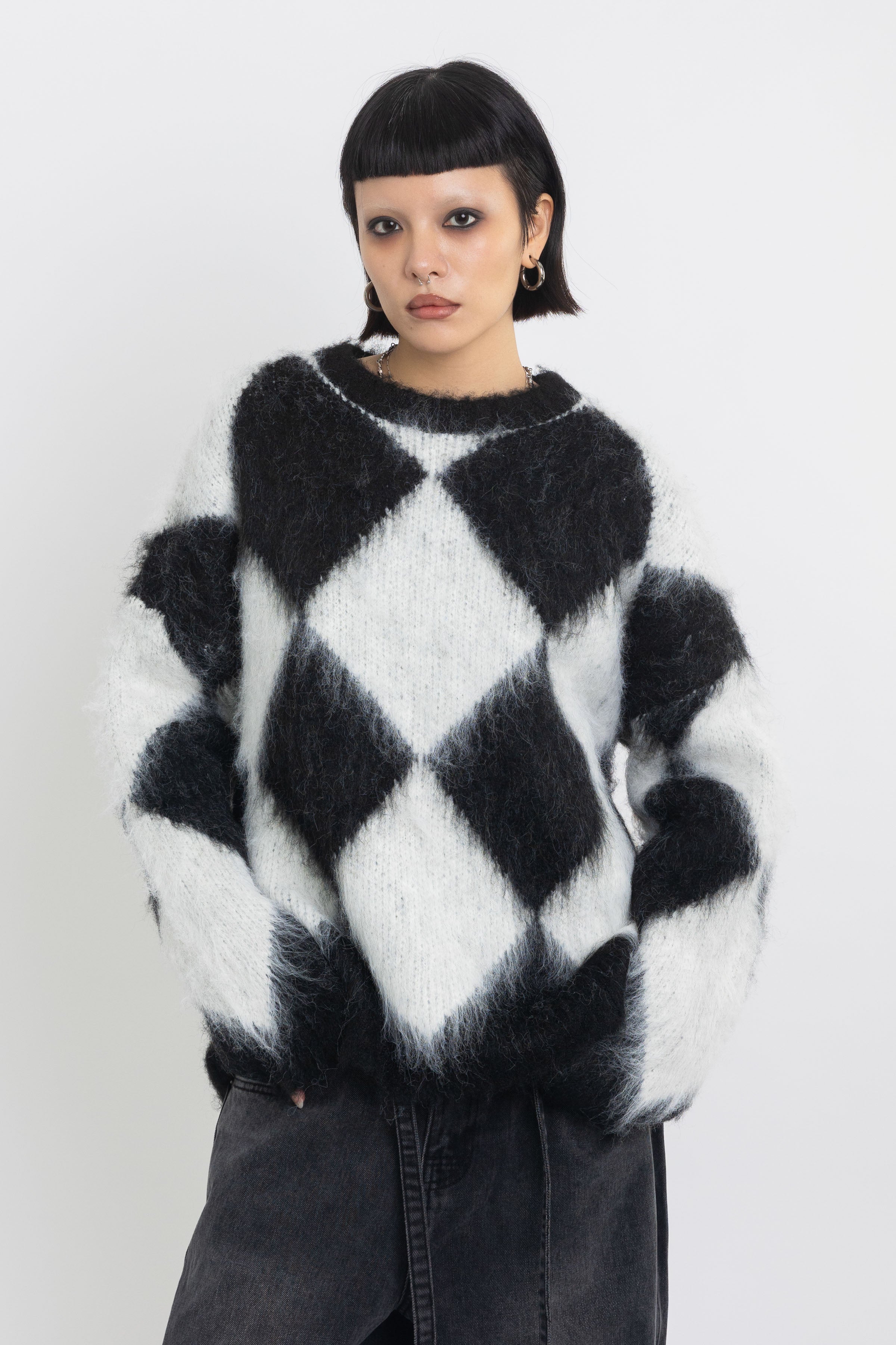 Black and white diamond argyle check fluffy knit oversized jumper, worn by model