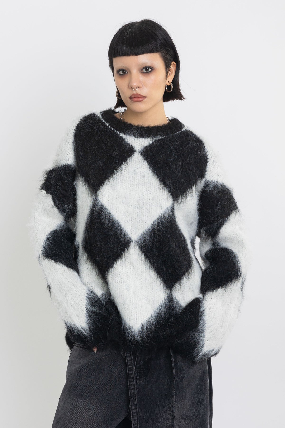 Black and white diamond argyle check fluffy knit oversized jumper, worn by model