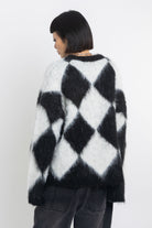 Black and white diamond argyle check fluffy knit oversized jumper, worn by model