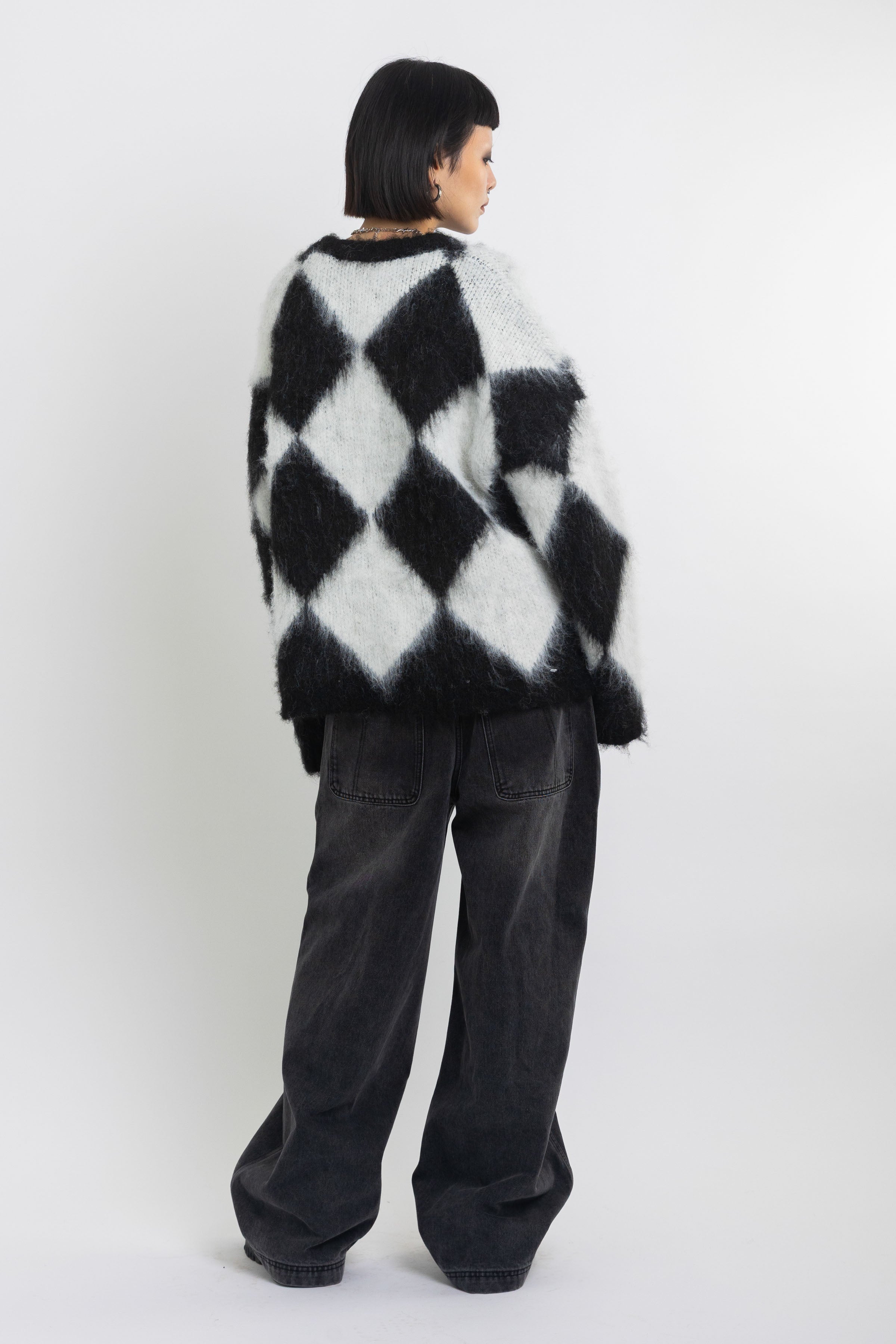 Black and white diamond argyle check fluffy knit oversized jumper, worn by model