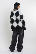 Black and white diamond argyle check fluffy knit oversized jumper, worn by model