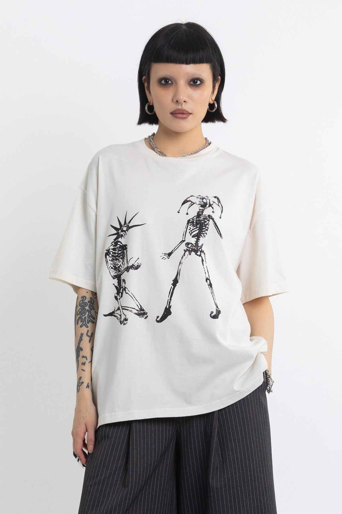 Vintage wash oversized graphic t-shirt with skeleton print, worn by model