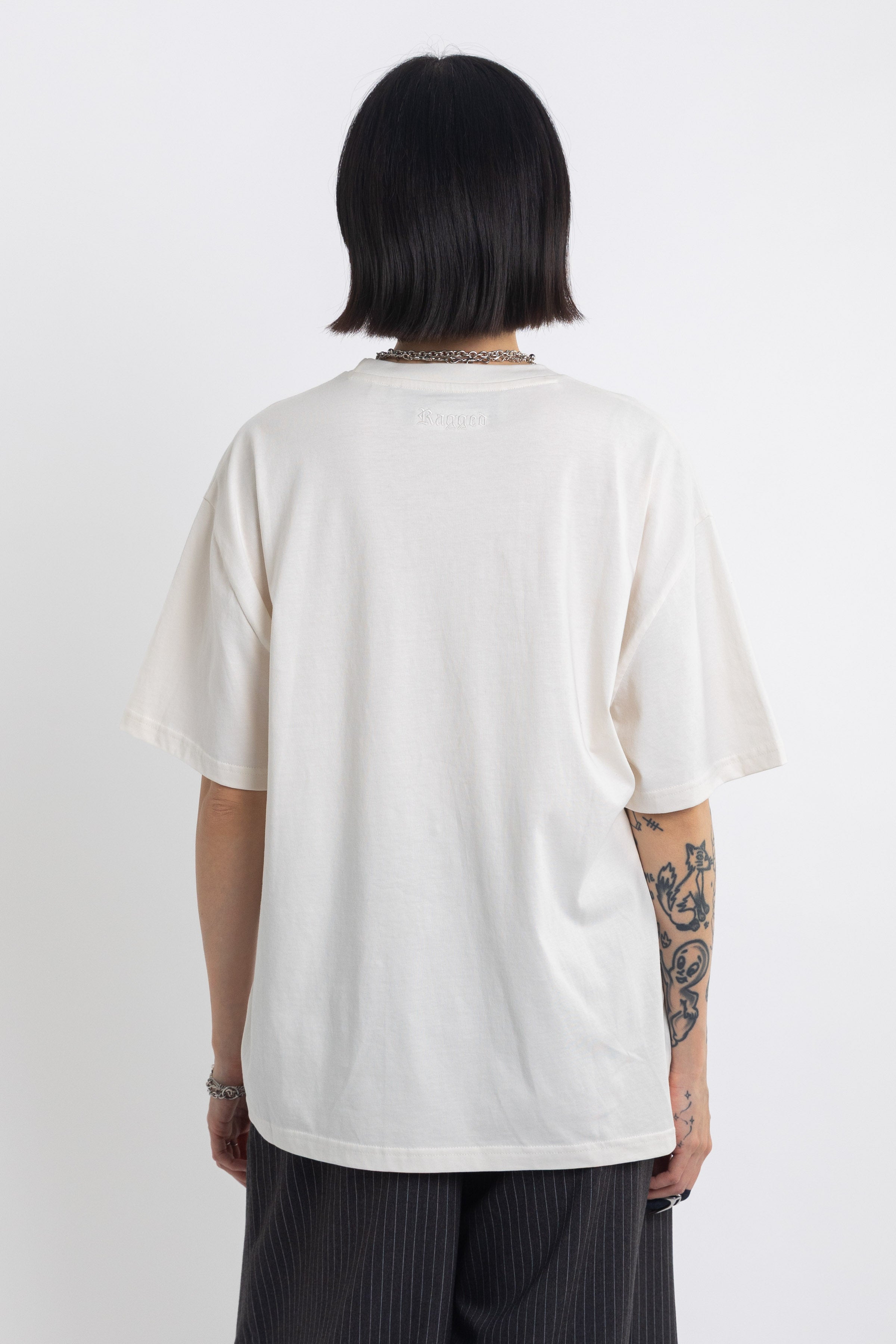 Vintage wash oversized graphic t-shirt with skeleton print, worn by model
