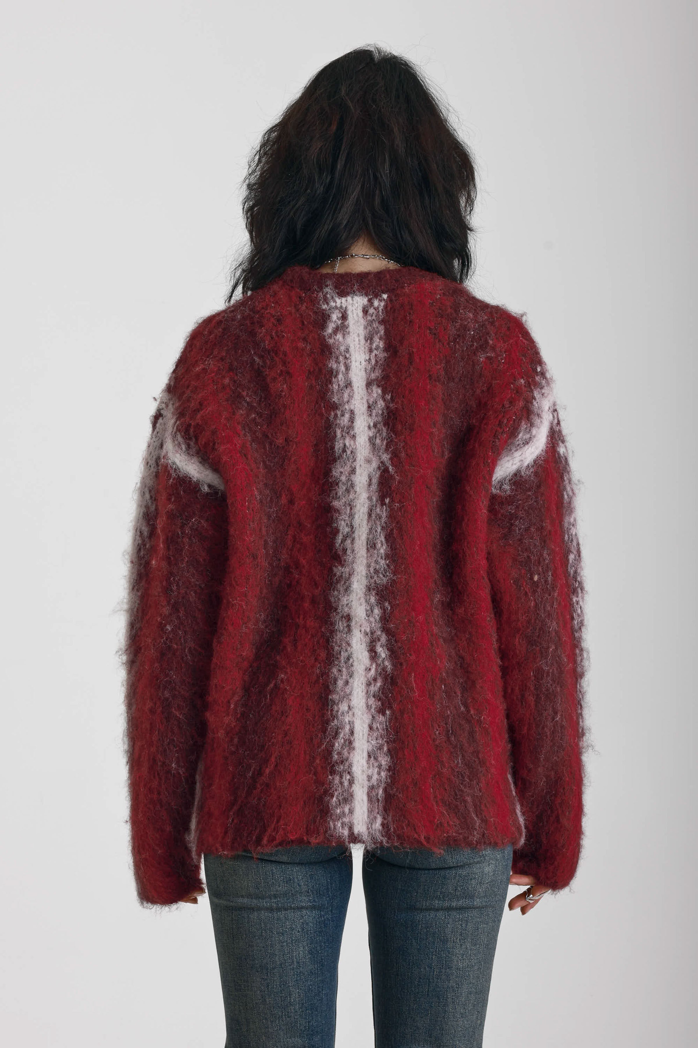 Red and white vertical stripe oversized knit jumper in fluffy brushed yarn, worn by model