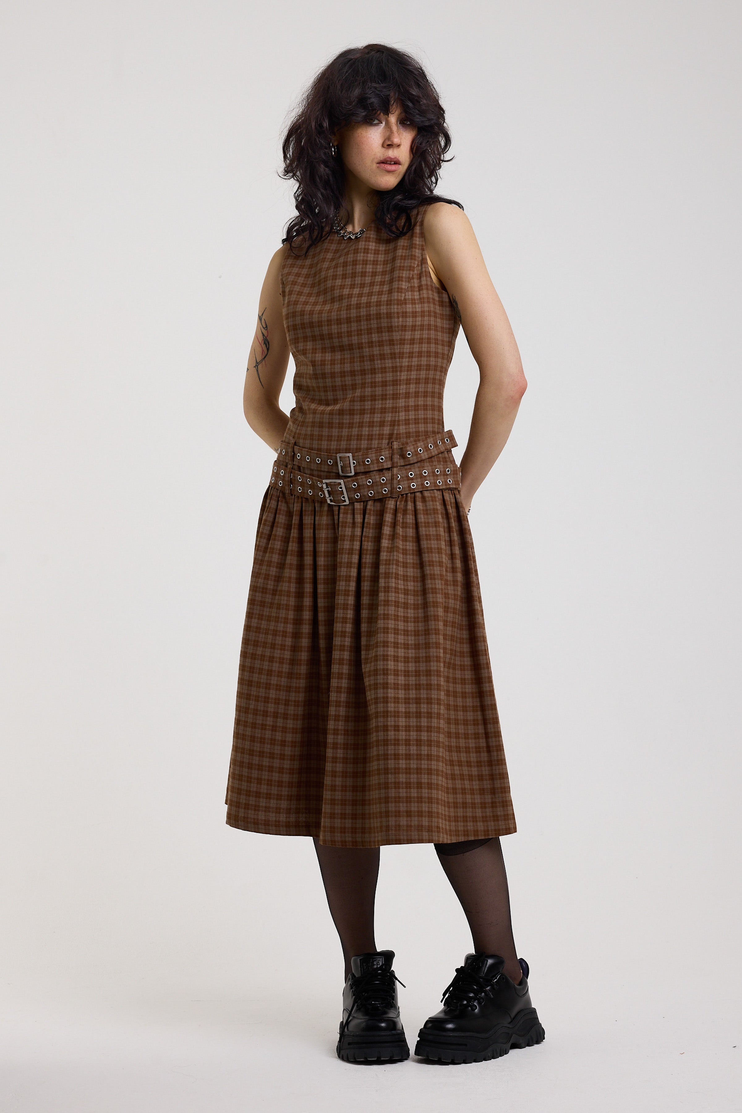 Brown tartan check midi dress with double eyelet belt and full skirt, worn by model