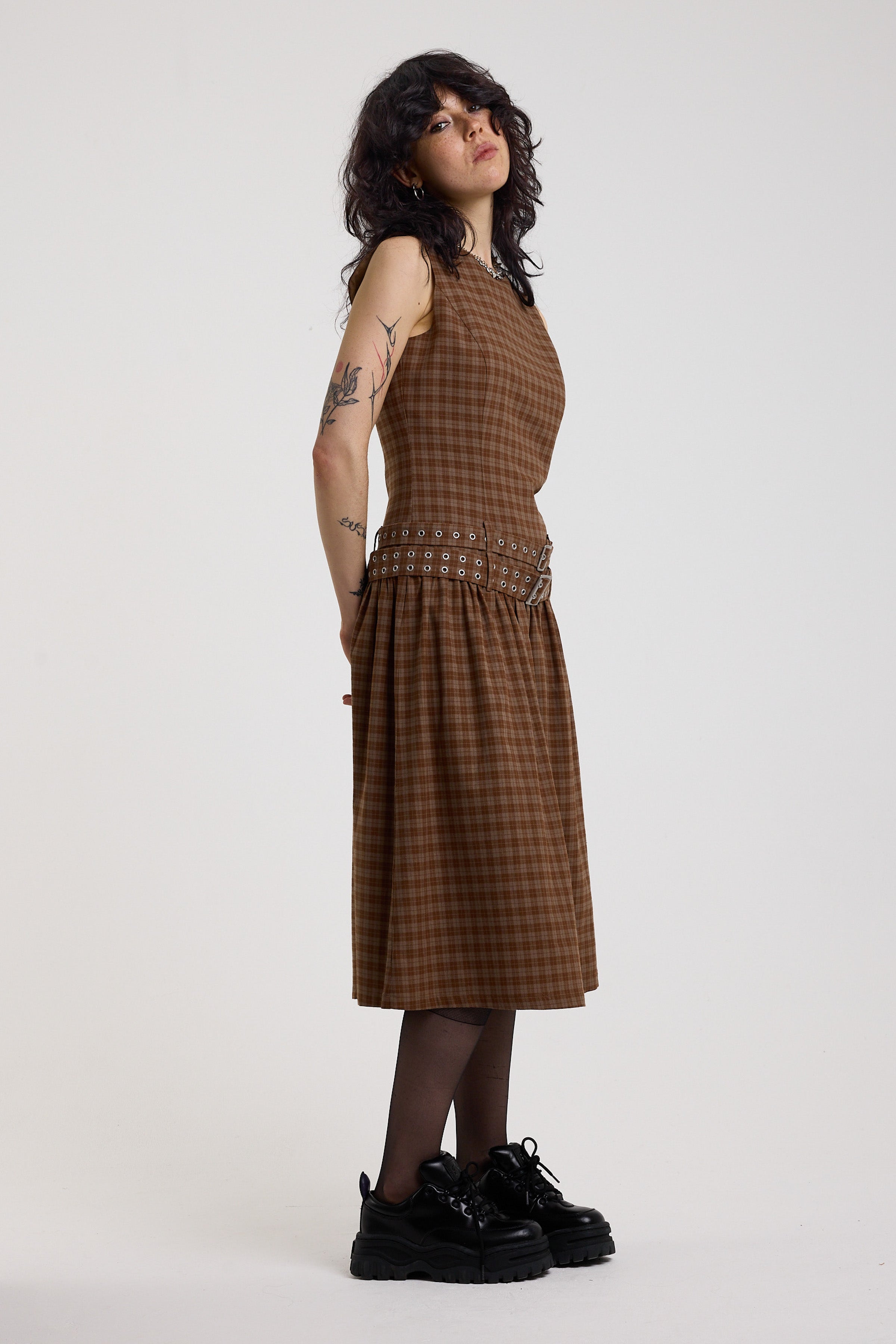 Brown tartan check midi dress with double eyelet belt and full skirt, worn by model