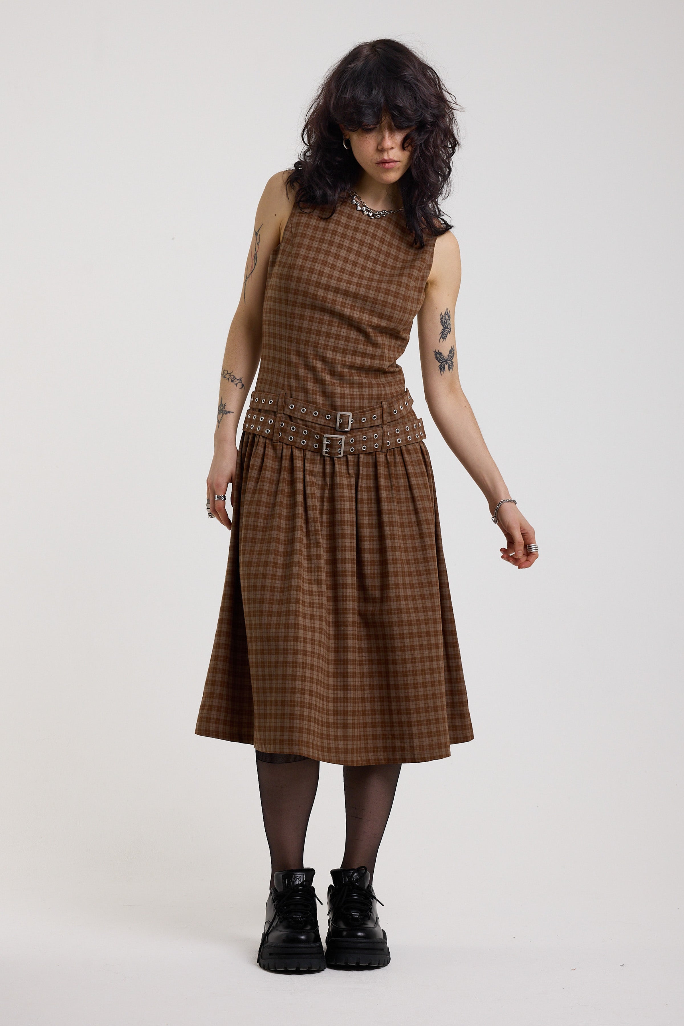 Brown tartan check midi dress with double eyelet belt and full skirt, worn by model
