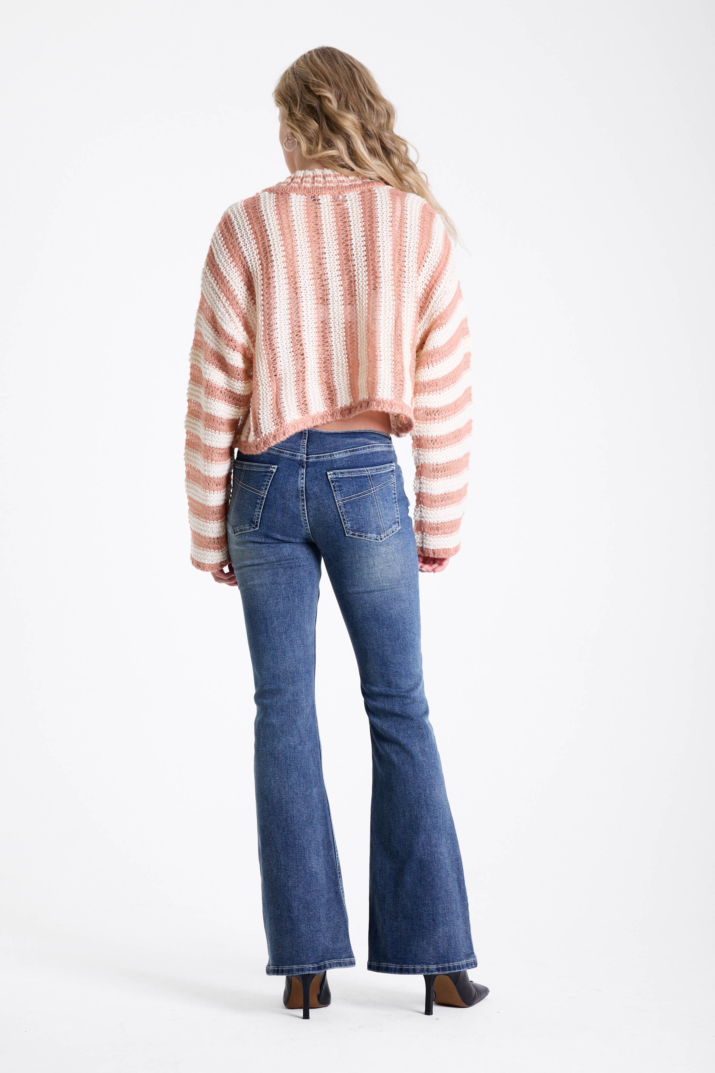 Pink and white stripe open knit v-neck jumper, worn by model