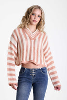 Pink and white stripe open knit v-neck jumper, worn by model