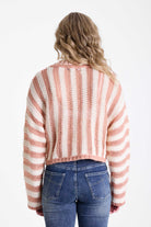 Pink and white stripe open knit v-neck jumper, worn by model