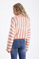 Pink and white stripe open knit v-neck jumper, worn by model