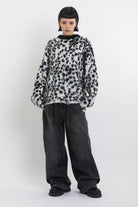 Black and white dalmatian print oversized fuzzy knit jumper, worn by model