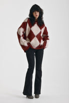Burgundy and ecru argyle diamond check oversized knit jumper in brushed fluffy yarn, worn by model