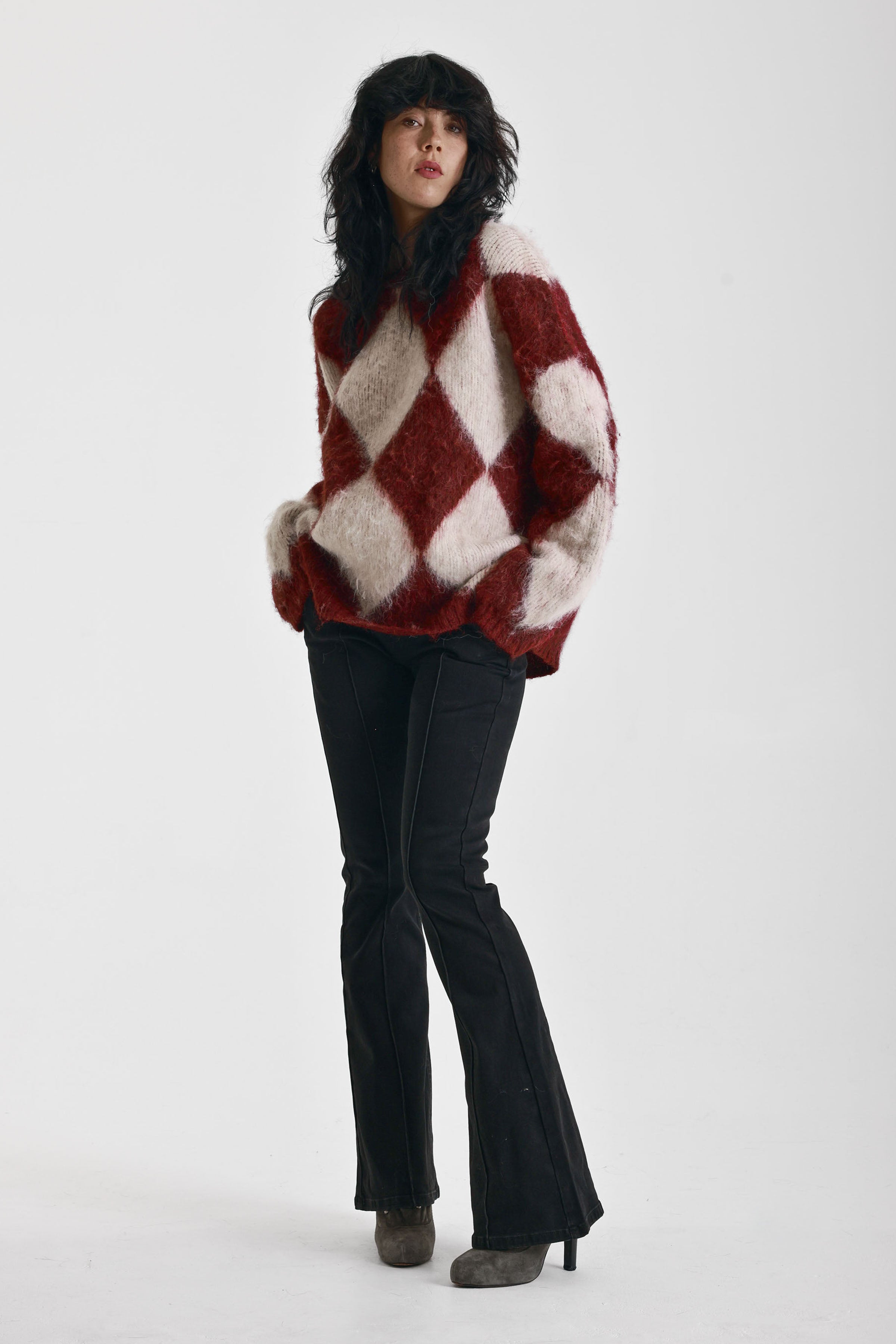 Burgundy and ecru argyle diamond check oversized knit jumper in brushed fluffy yarn, worn by model