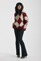 Burgundy and ecru argyle diamond check oversized knit jumper in brushed fluffy yarn, worn by model
