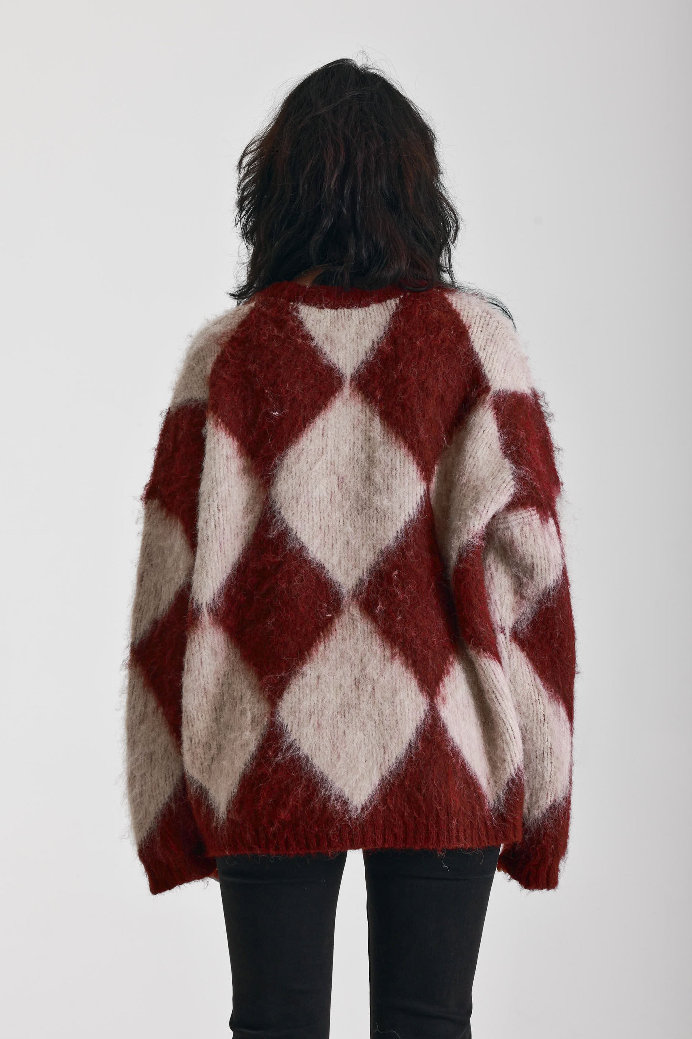 Burgundy and ecru argyle diamond check oversized knit jumper in brushed fluffy yarn, worn by model