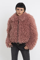 Dusty pink shaggy faux fur jacket with oversized collar and 2-way zip closure, worn by model