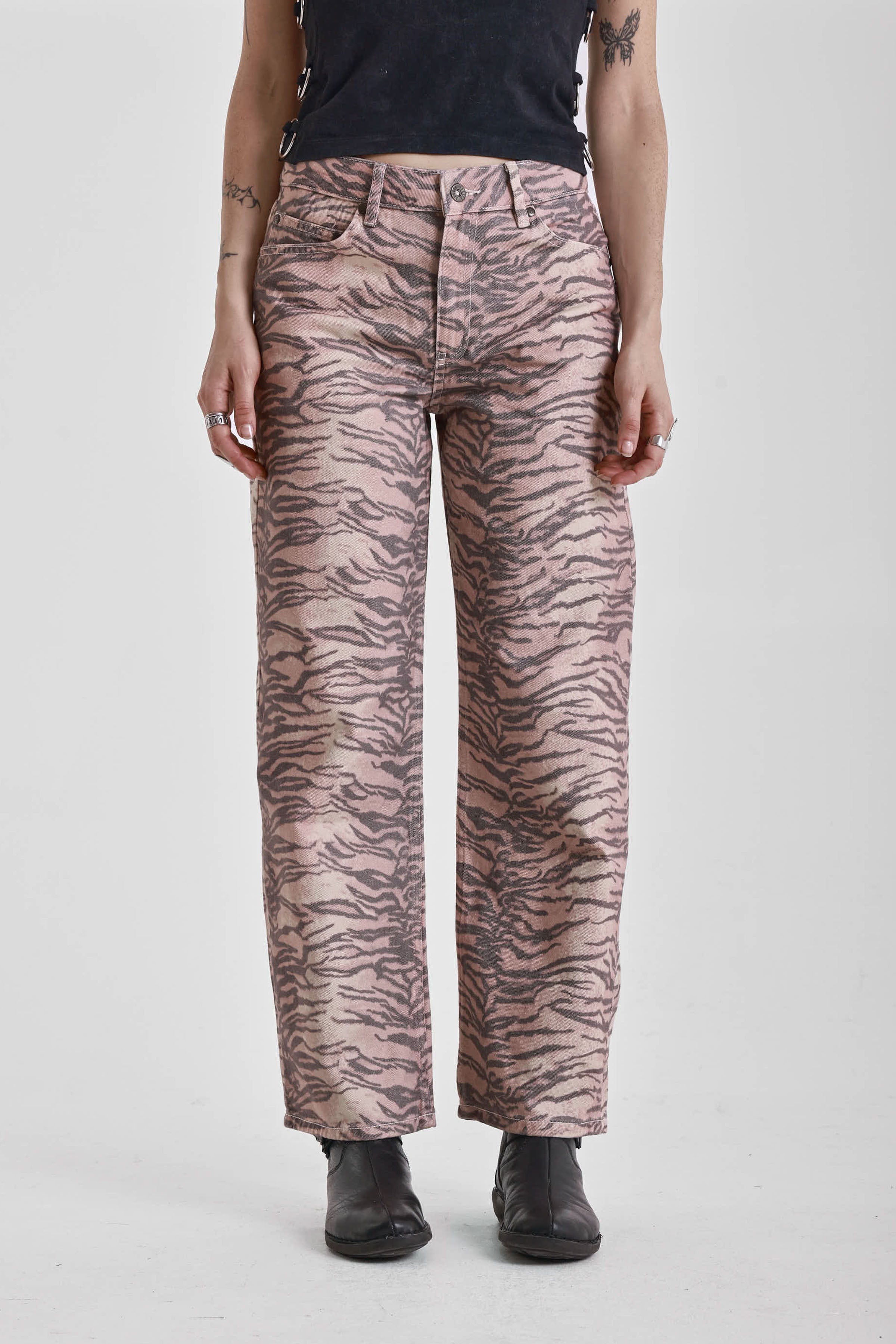 Brown tiger print relaxed straight leg jeans, worn by model