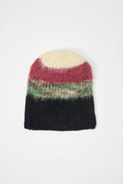 Black, green, pink and ecru textured fuzzy stripe knit beanie winter hat.